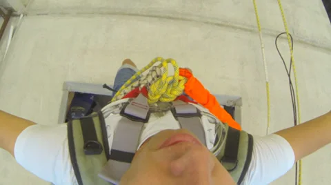 Jumping on a rope from the 15th floor Stock Footage 30284479