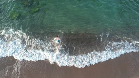 Jumping sea by beach Stock Footage 206486932