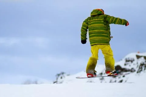 Jumping snowboarder Stock Photos