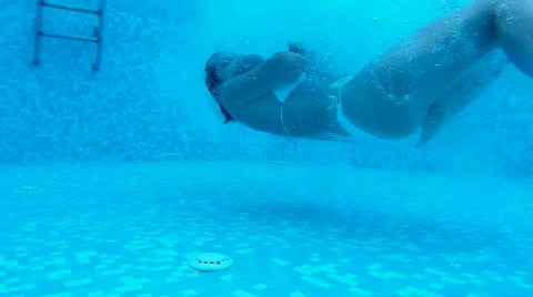 Jumping into the swimming pool Stock-Footage 42695905