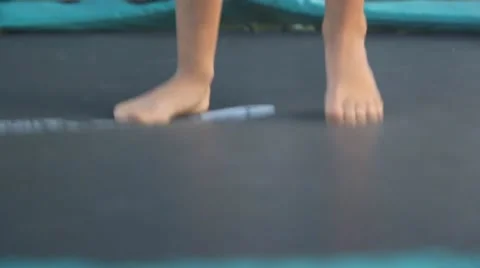 Jumping on a trampoline Stock Footage 47551344