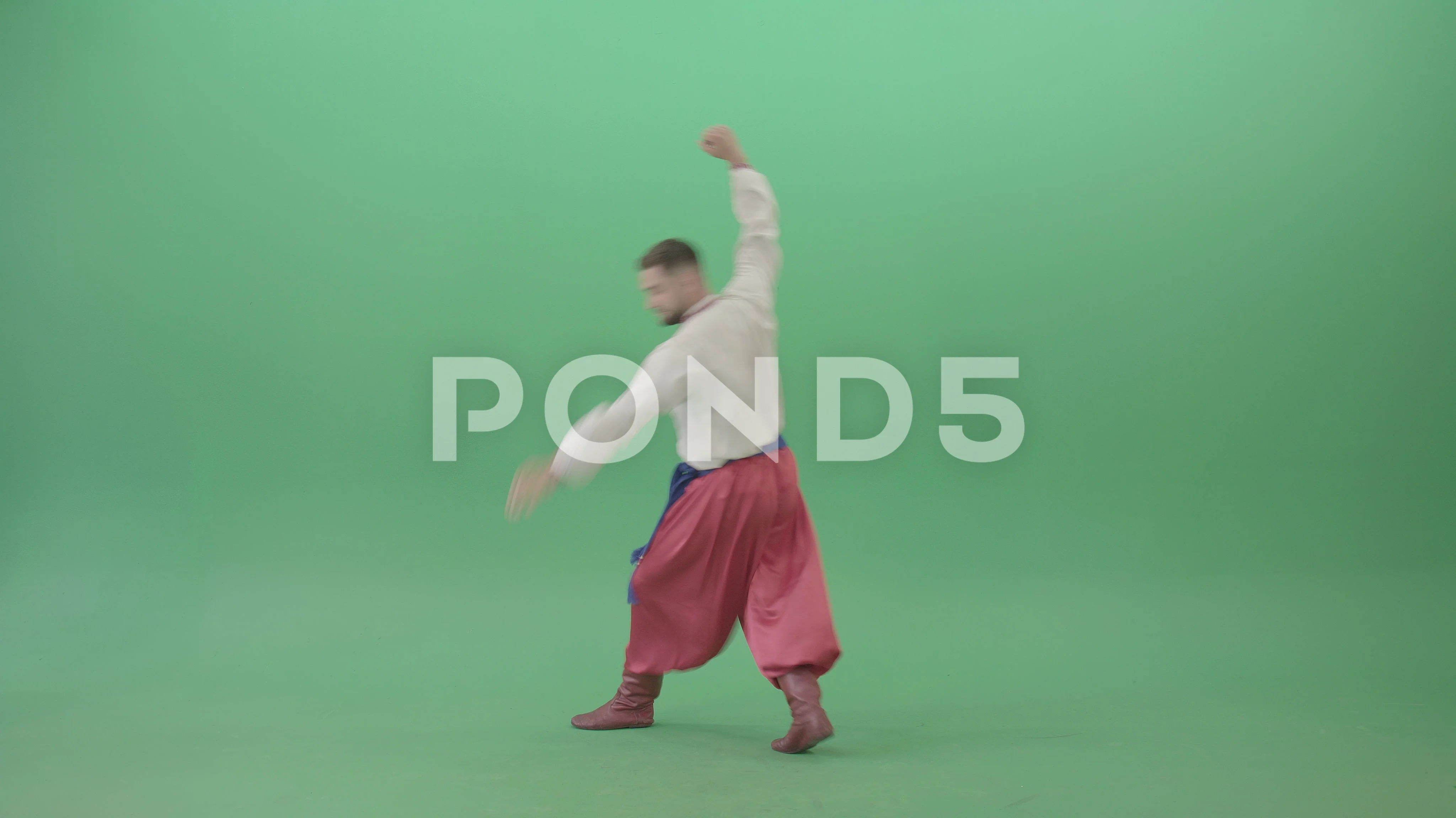 Jumping Ukrainian man dance folk Hopak isolated on Green Screen