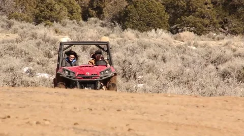 Jumping a UTV ATV in the Desert Recreational Stock Footage 47035702
