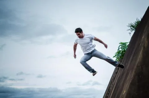 Jumping off wall Stock Photos