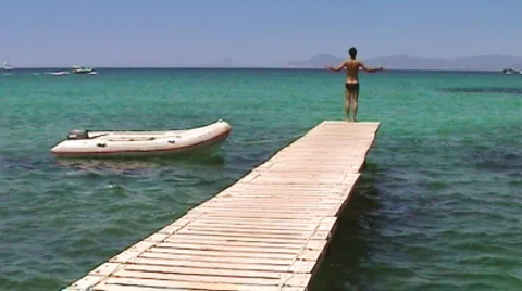 Jumping into the water Stock Footage 869584