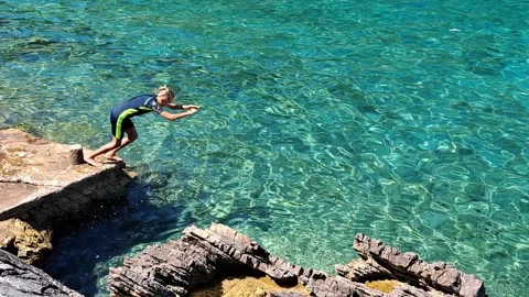 Jumping into water Stock-Footage 315570257