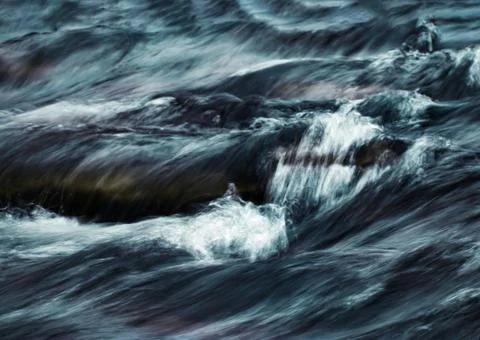 Jumping waves on the river Stock Photos