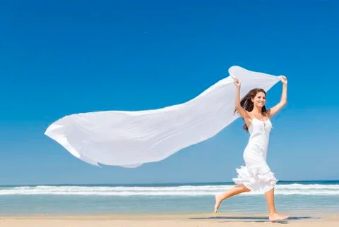 Jumping with a white scarf Stock Photos