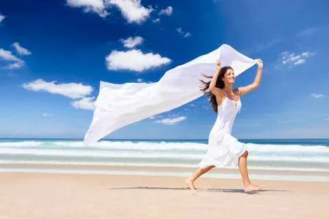 Jumping with a white scarf Stock Photos