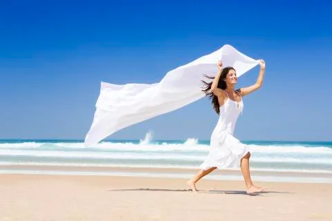 Jumping with a white scarf Stock Photos
