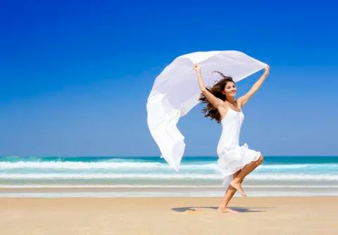 Jumping with a white scarf Stock Photos