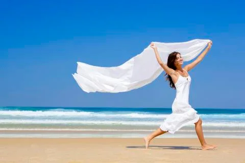 Jumping with a white scarf Stock Photos