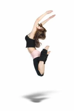 Jumping young dancer isolated on white background Photos