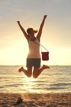 Jumps up on a beach Stock Photos