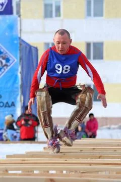 Jumps through sledge Fotos de archivo