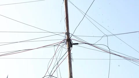Junction of internet cable on the pole, poorly managed wires on pole Stock Footage 332557906