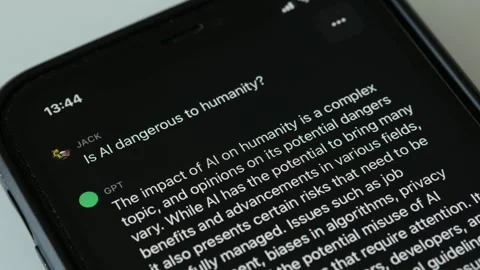 JUNE 1, 2023: Using new OpenAI ChatGPT App on an iPhone, Close-up Stock Footage 242696669