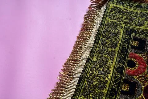 June 12, 2023, Flat lay photo of the Koran, prayer rugs and prayer beads fo.. Stock Photos