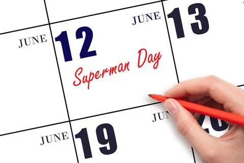 June 12. Hand writing text Superman Day on calendar date. Save the date. Stock Photos