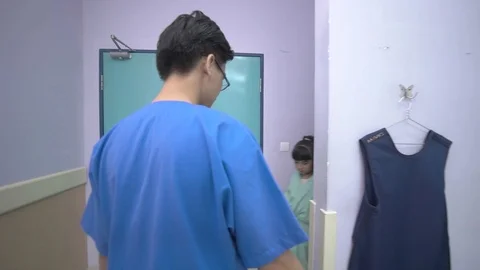 June 2016. Doctor was preparing Xray scanning for little patient at Medical U Stock Footage 127558482