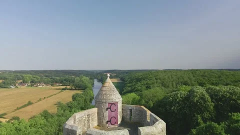 June 2022 - Drop down aerial shot of Chāteau du Soudun 4K 60fps Stock Footage 203847967