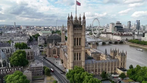 June 22, 2025, London:Drone View 4K60 – Westminster Big Ben London Eye Thames Stock Footage 316717822