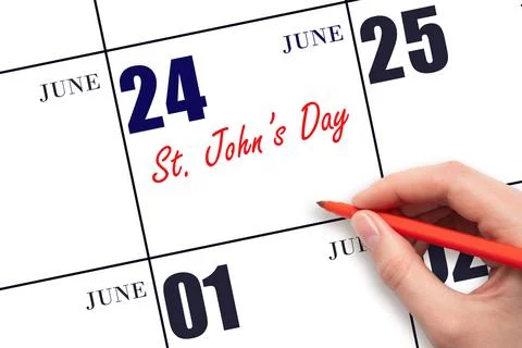 June 24. Hand writing text St. John's Day on calendar date. Save the date. Stock Photos