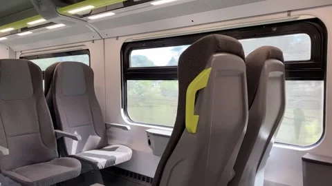 June 5, 2026 - Italy - Empty passenger train carriage with seats Vídeos de archivo 338054947