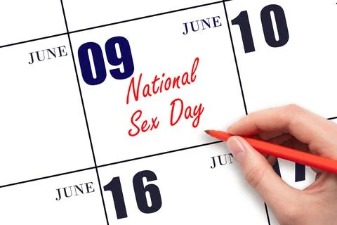 June 9. Hand writing text National Sex Day on calendar date. Save the date. Stock Photos