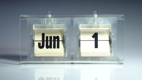 June. Mechanical tabletop flip calendar. Stock Footage 83275533