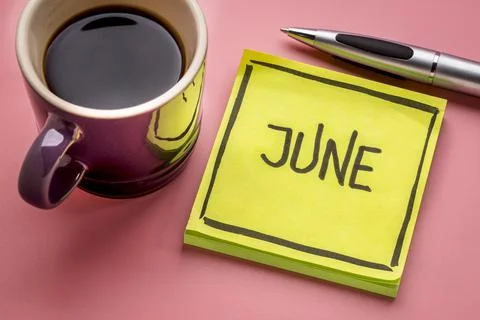 June text on sticky note with coffee Stock Photos
