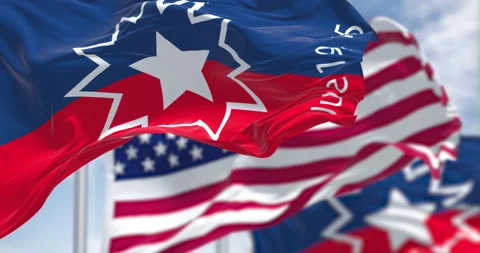 The Juneteenth flag waving in the wind with the american flag Stock Footage 197325202