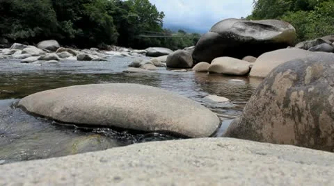 Jungle River Flows over Rocks Stock Footage 9276549