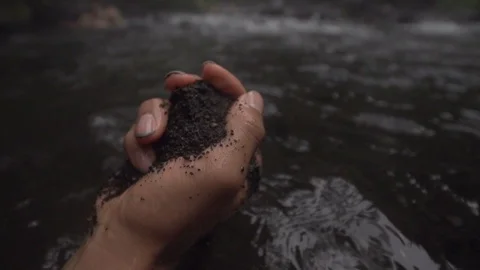 Jungle River Mud Dirt Texture Rubbing in Between Hands Slow Motion Stock Footage 87723433