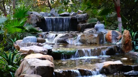 Jungle waterfall cascade in tropical rainforest with rock and turquoise blue pon 動画素材 145886321