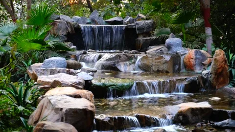 Jungle waterfall cascade in tropical rainforest with rock and turquoise blue pon Vidéo 145886329