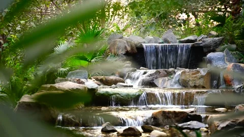 Jungle waterfall cascade in tropical rainforest with rock and turquoise blue pon 動画素材 145886351