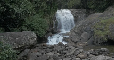 A jungle waterfall at dusk Stock Footage 120054659