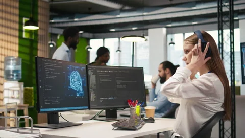 Junior dev developing AI software applications, optimizing code, listening music Stock Footage 313168013