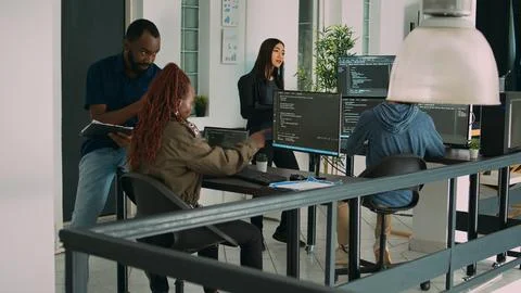 Junior developer working on terminal window to code system script 스톡 사진