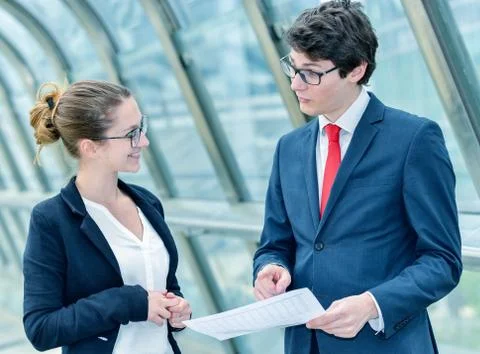 Junior executives dynamics consulting commercial documents Stock Photos