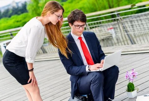 Junior executives dynamics working outside of their office Stock Photos