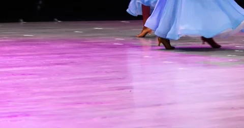 Junior girls in light blue dresses dance a standard program in ballroom danc Stock Footage 310036619