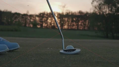 Junior golf player is putting off a ball from hole Video stock 95897615