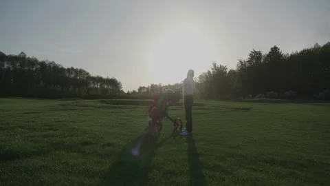 Junior Golfing Into Sunset. Video stock 95122404