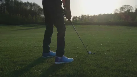 Junior Golfing Into Sunset. Stock Footage 95122863