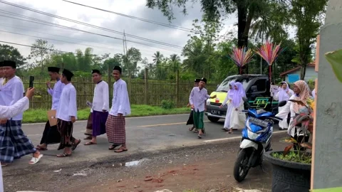 Junior High School students take part in the National Santri Day parade Stock Footage 219629668
