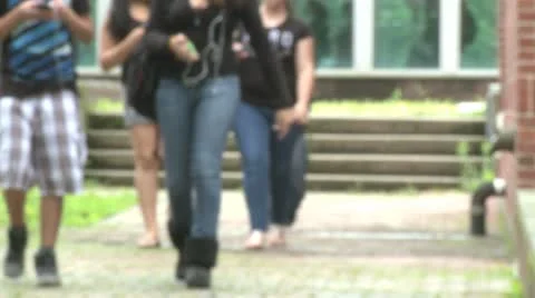 Junior high students leaving school (1 of 5) Stock Footage 10336056