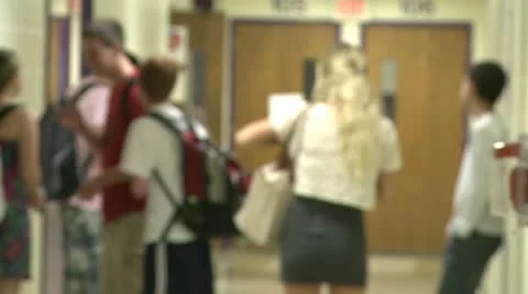Junior high students standing in hallway Stock Footage 10383183