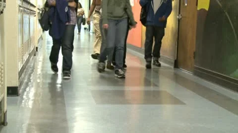 Junior High students walking down hall by lockers (1 of 7) Stock Footage 10360427